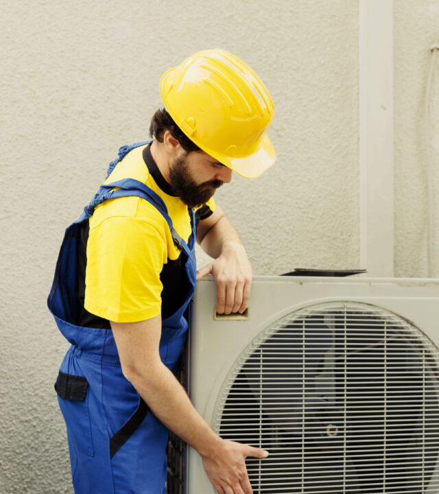 Technician getting air conditioner ready Common LG AC Issues We Fix – Fast, Affordable & Genuine